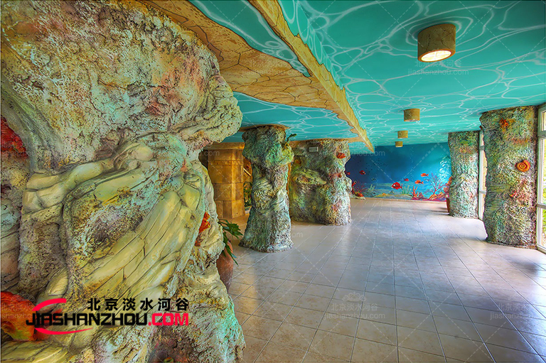 圍繞柱子設(shè)計(jì)制作塑石水泥假山是我們的強(qiáng)項(xiàng)